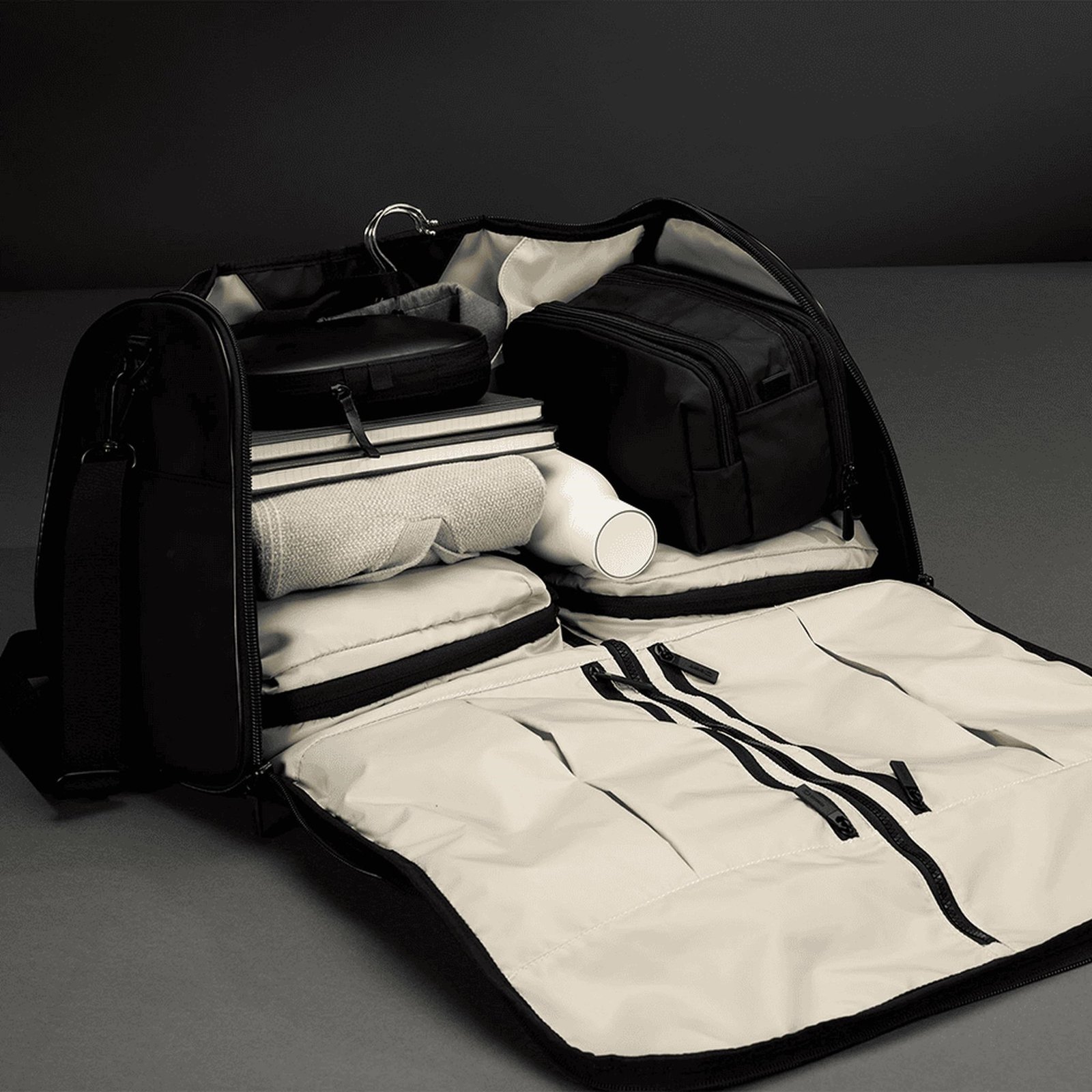 Ogio Pace Pro Suiter 53L Duffel taška, černá