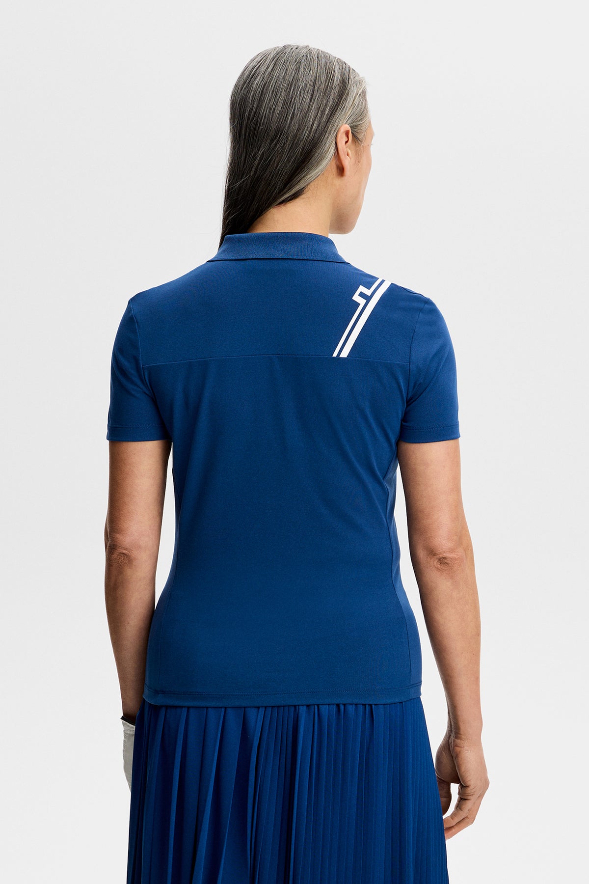 D&aacute;msk&eacute; polo J.Lindeberg Melli Estate Blue - lifestyle na hřišti