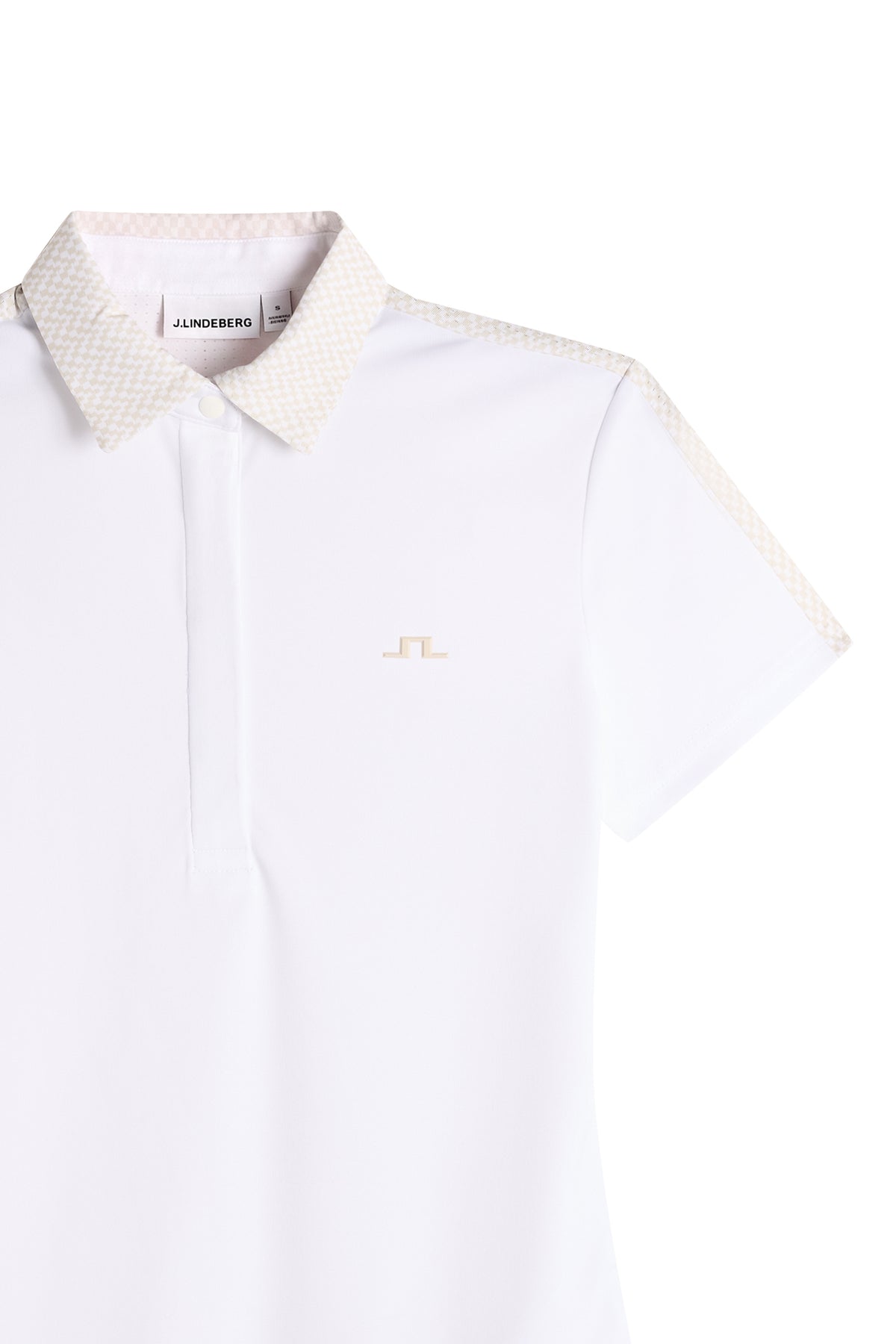 J.Lindeberg Cara Polo Print White – lifestylový pohled ukazující polo v akci na hřišti