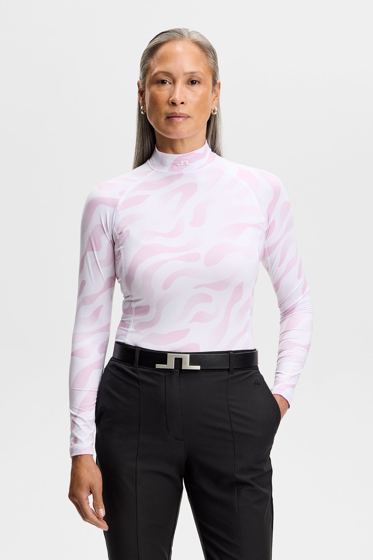 J.Lindeberg Ella Print Compression Top Bunker Fade White Orchid – přední pohled na modelce