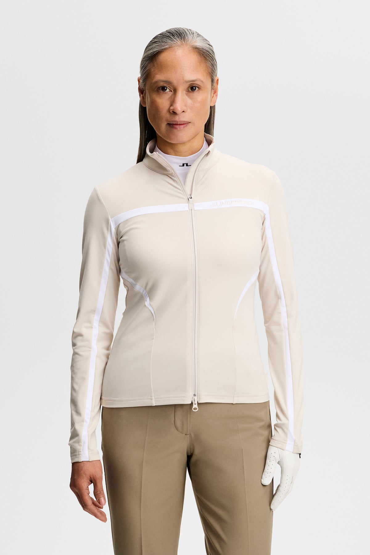 J.Lindeberg Janice Mid Layer Moonbeam – přední pohled ukazující tkaninu Light Mid a detail zipu